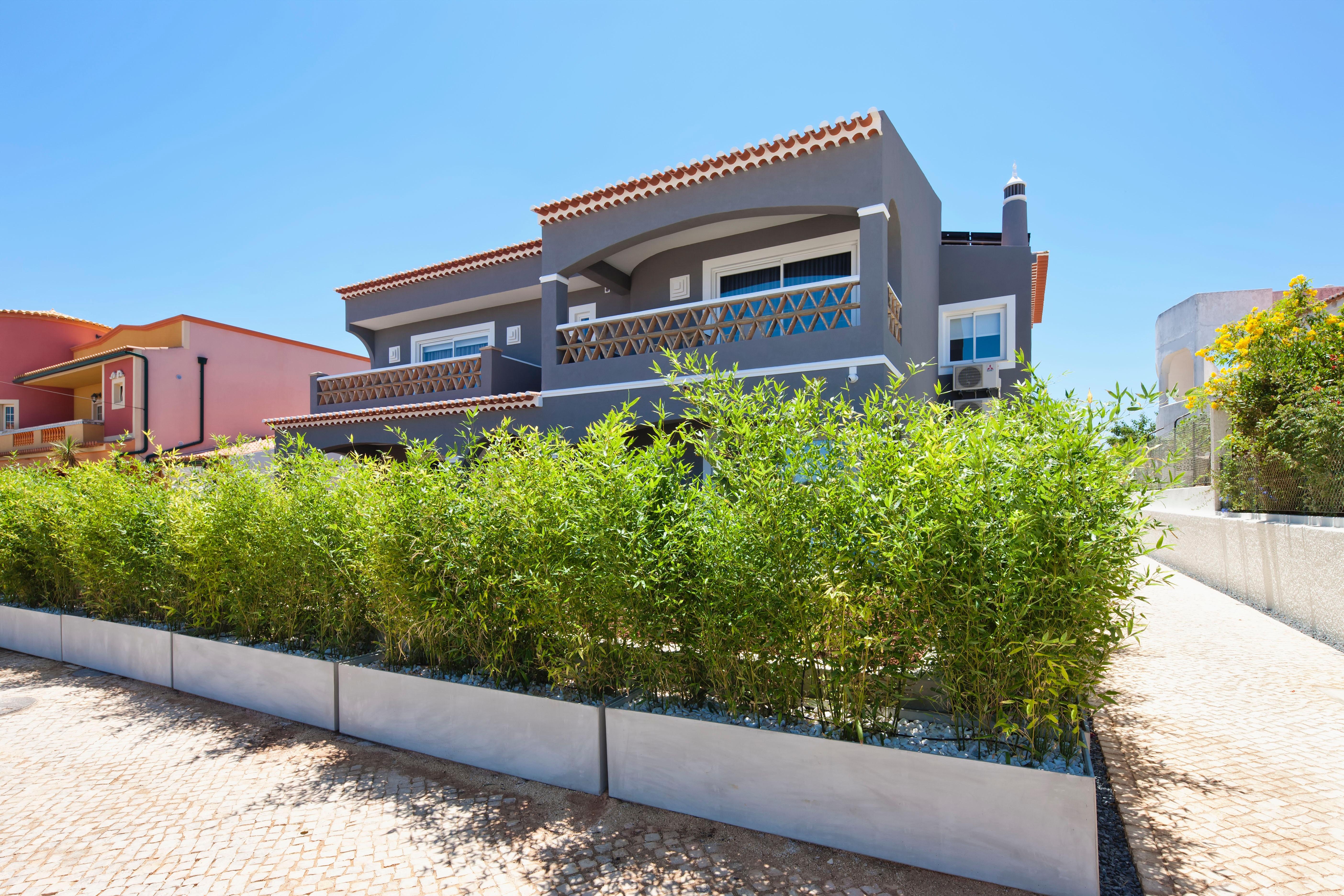 Costa D'Oiro Ambiance Village Lagos Exterior photo